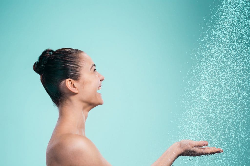 Woman enjoying a hot shower