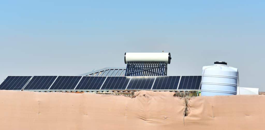 Solar water heating panels on a desert farm