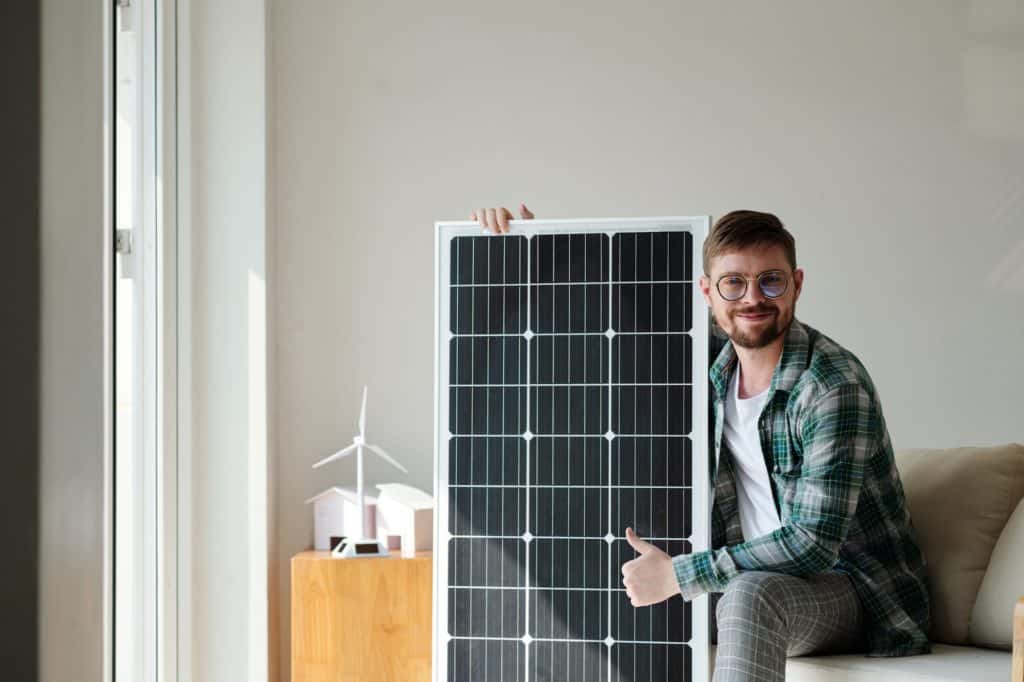 happy Man with Solar Panel